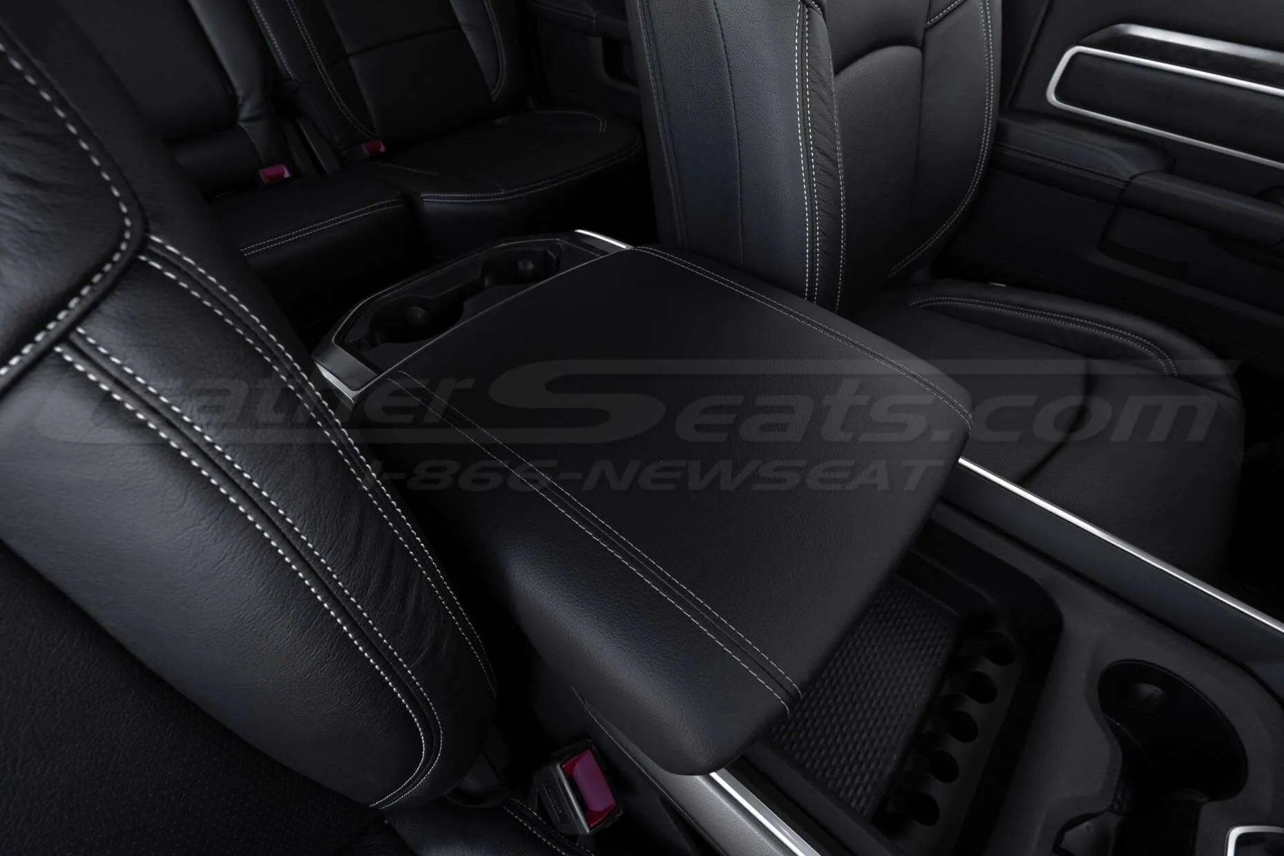 Close-up view of 2019-2022 Dodge Ram Console Lid cover in Black leather