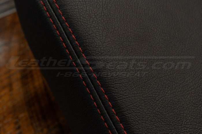 Contrasting Red stitching on console lid cover