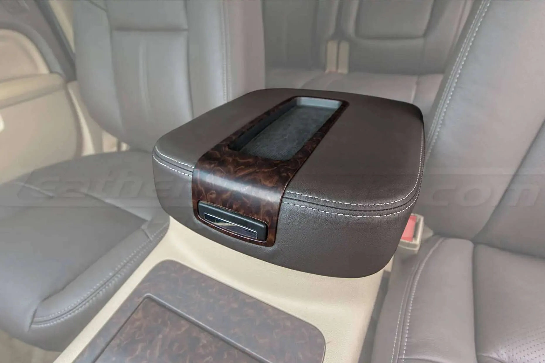 Console lid cover upholstery w/ contrasting stitching