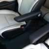 Black leather armrests with contrastng dune stitching