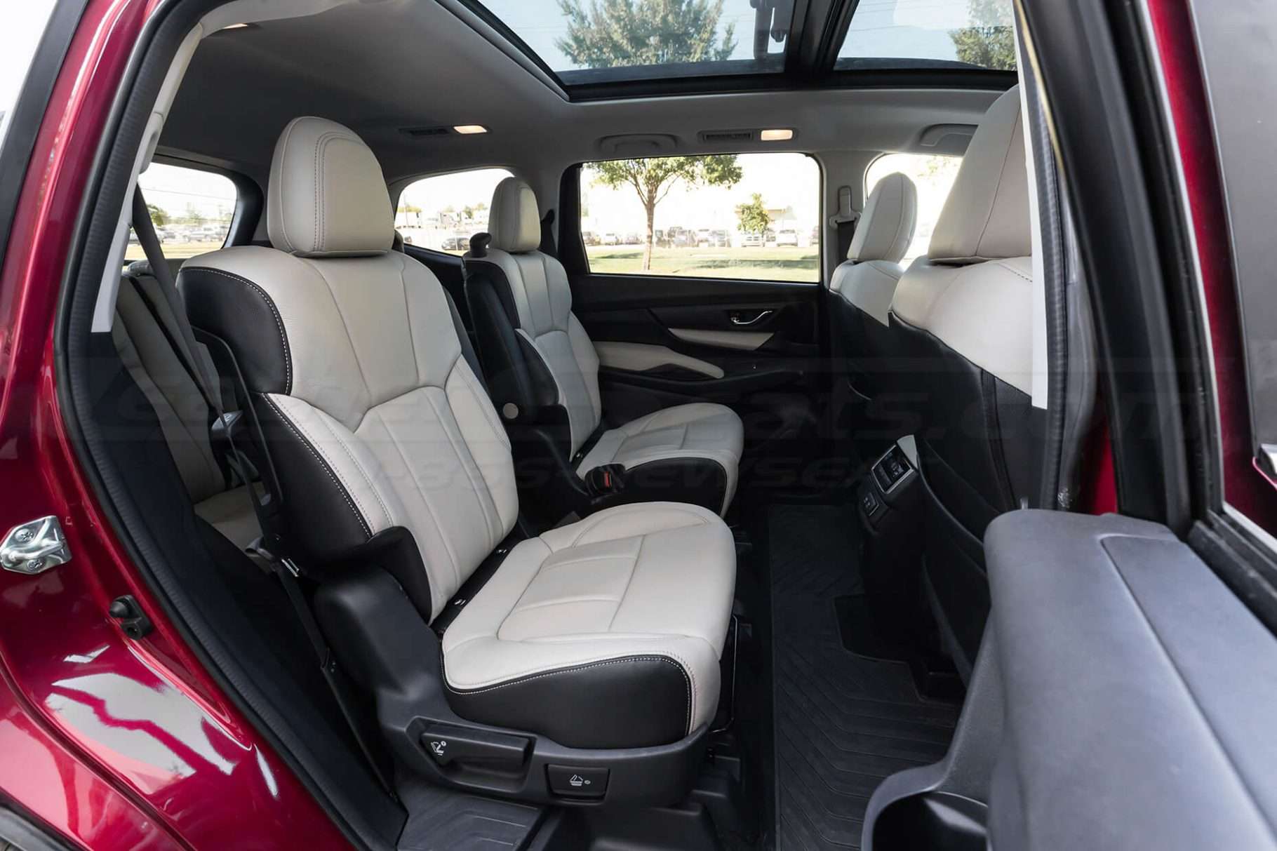 Two-Tone Facings in Black & Dune installed leather seats - Middle row from passenger side