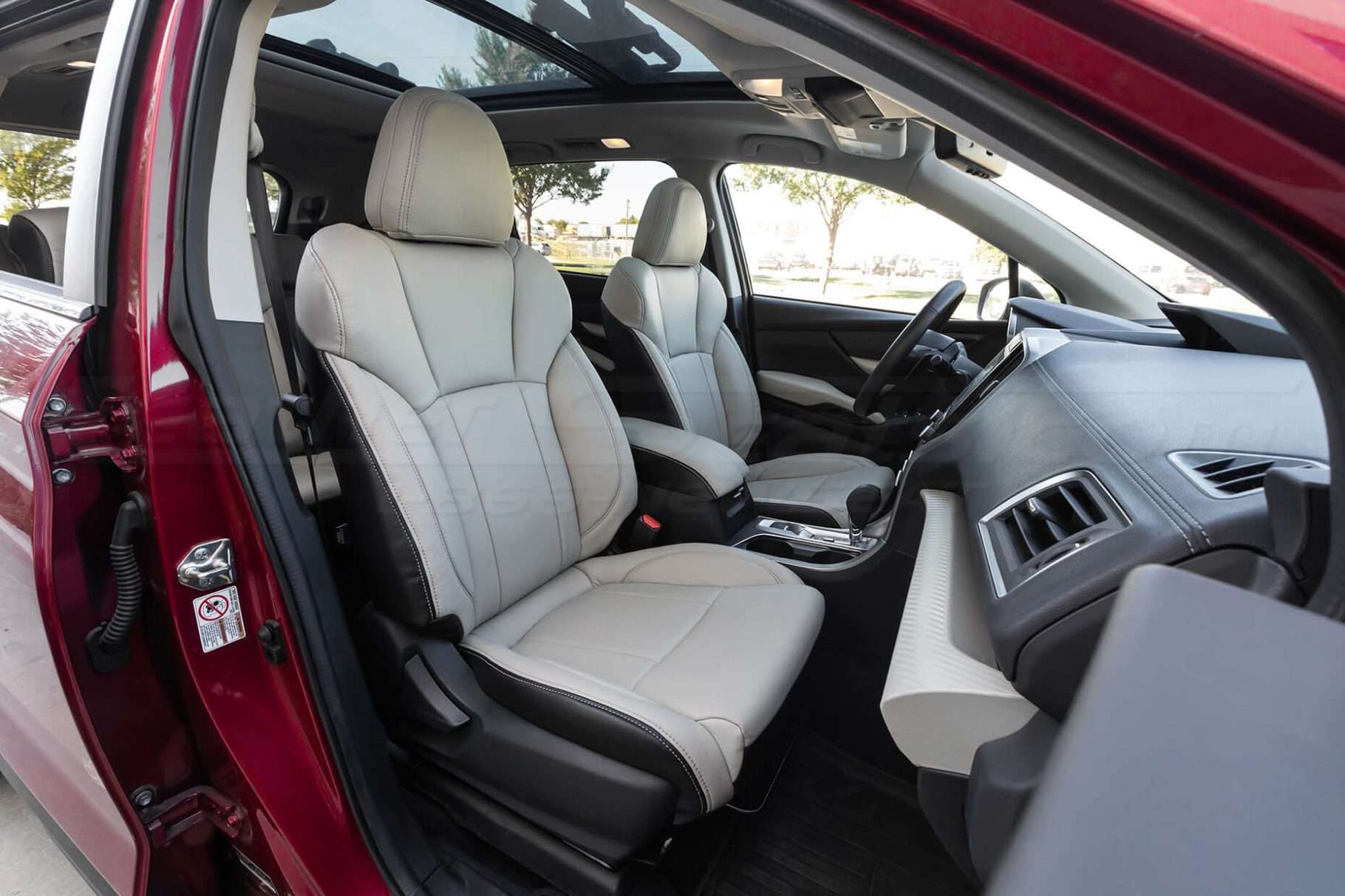 Altenrative view of front passenger side with Black & Dune leather seats