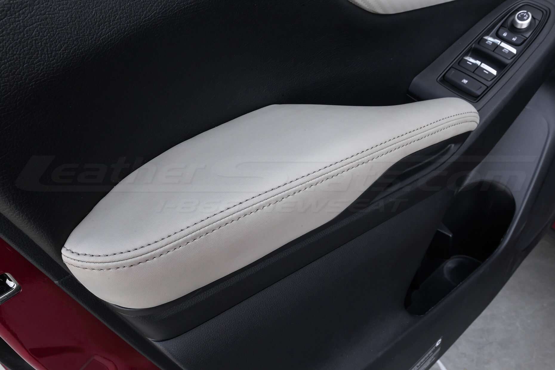 Close-up of leather door armrest
