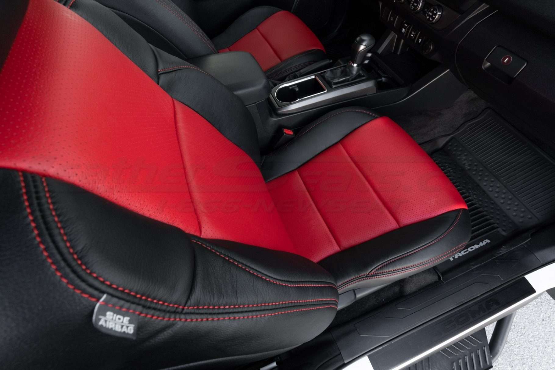 Top down view of front passenger leather seat with perofrated combo