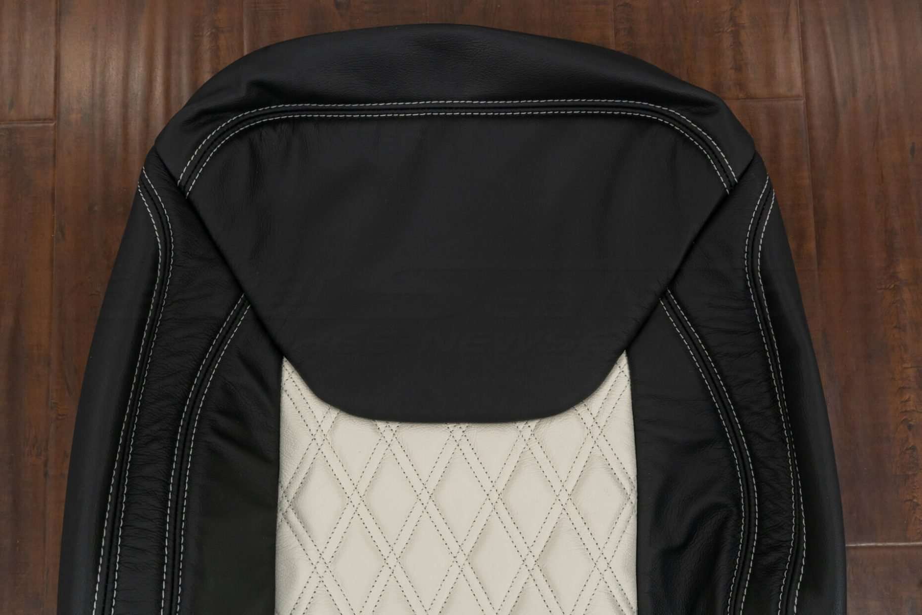Upper section of front backrest upholstery