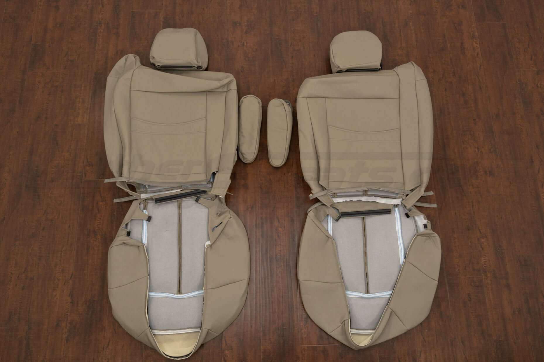 Back view of front seat upholstery & armrests