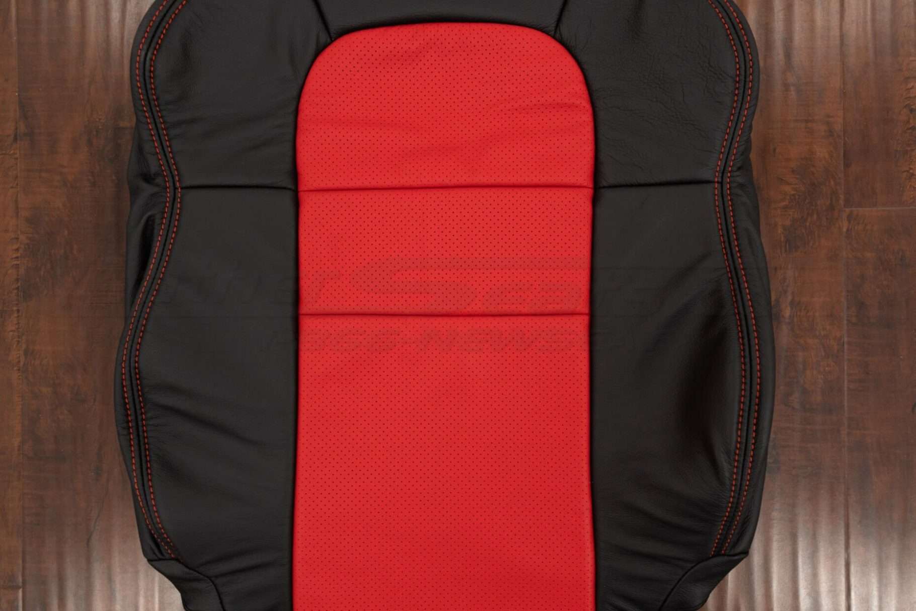 Perforated combo section of front backrest