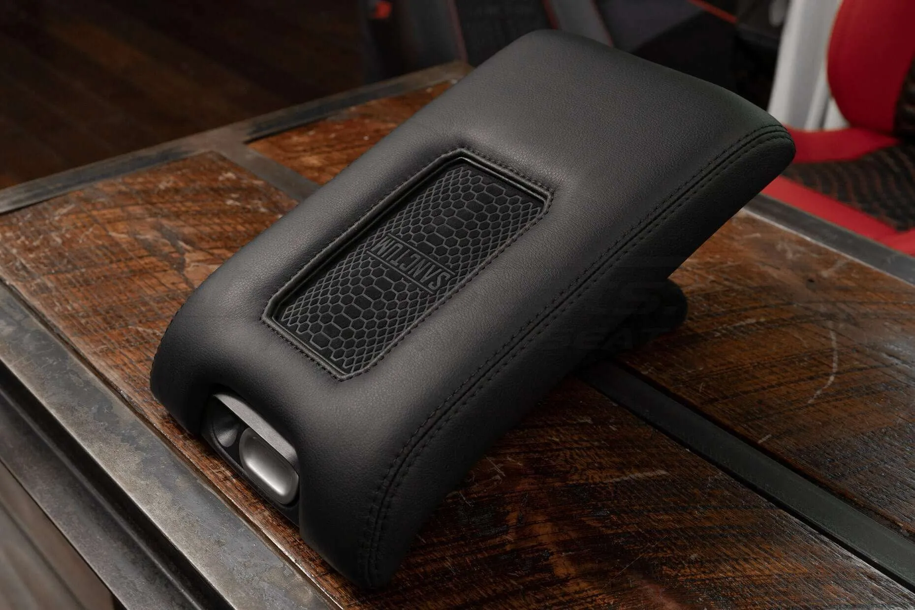 Ford F-150 Raptor Sanctum Wireless Charging Console - Side view with light reflaction