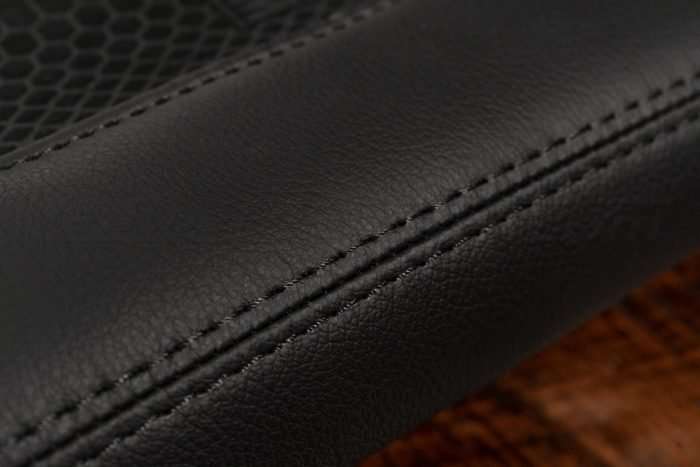 Matching Black double-stitching on Leather Sanctum Wireless Charging Console