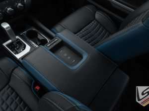 Driver side view of center console lid