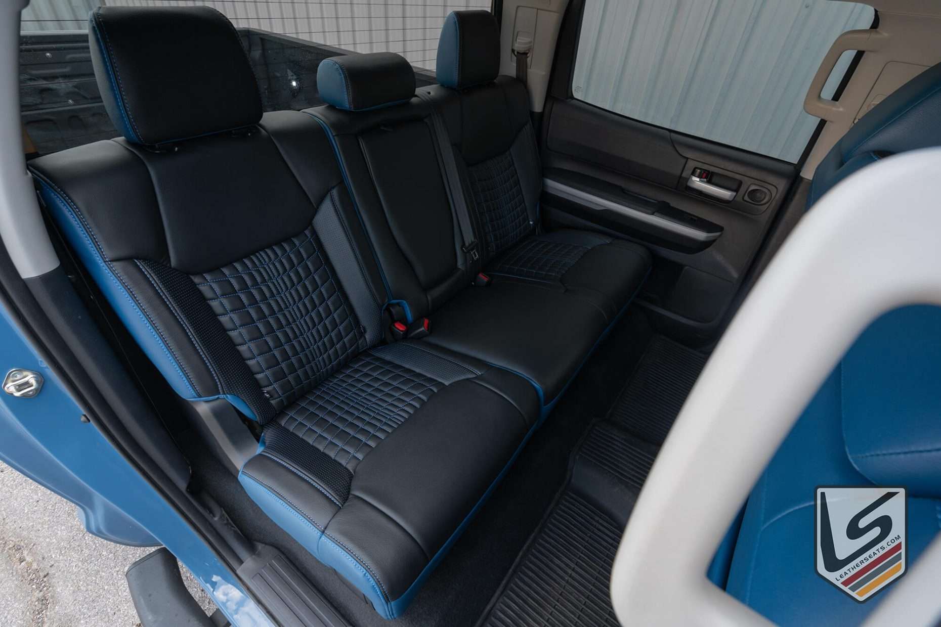 Toyota Tundra with custom leather seats - Rear seats from passenger side