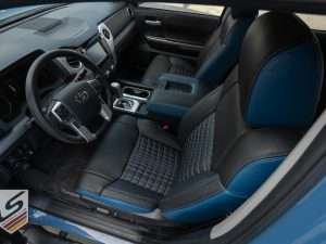 Top-down view of front driver's seat wit quilted inserts