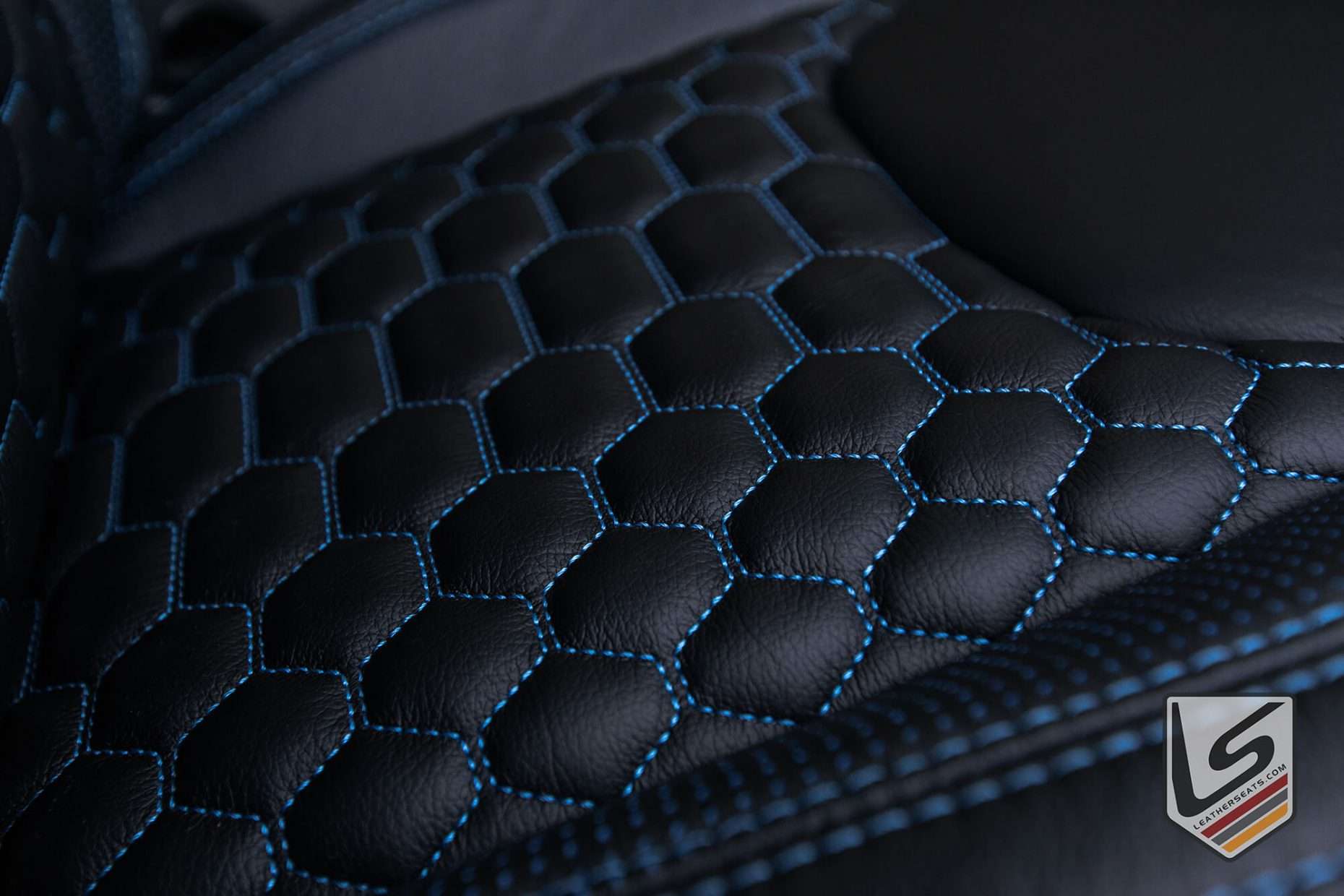 Close up of quilted Wrangler seat cushion with cobalt stitching