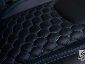 Close up of quilted Wrangler seat cushion with cobalt stitching
