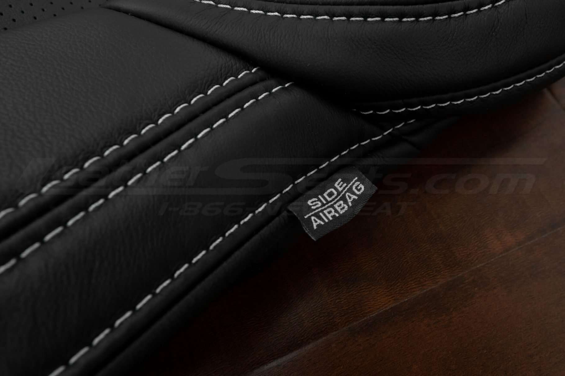 Dove Grey stitching next to Air Bag tag