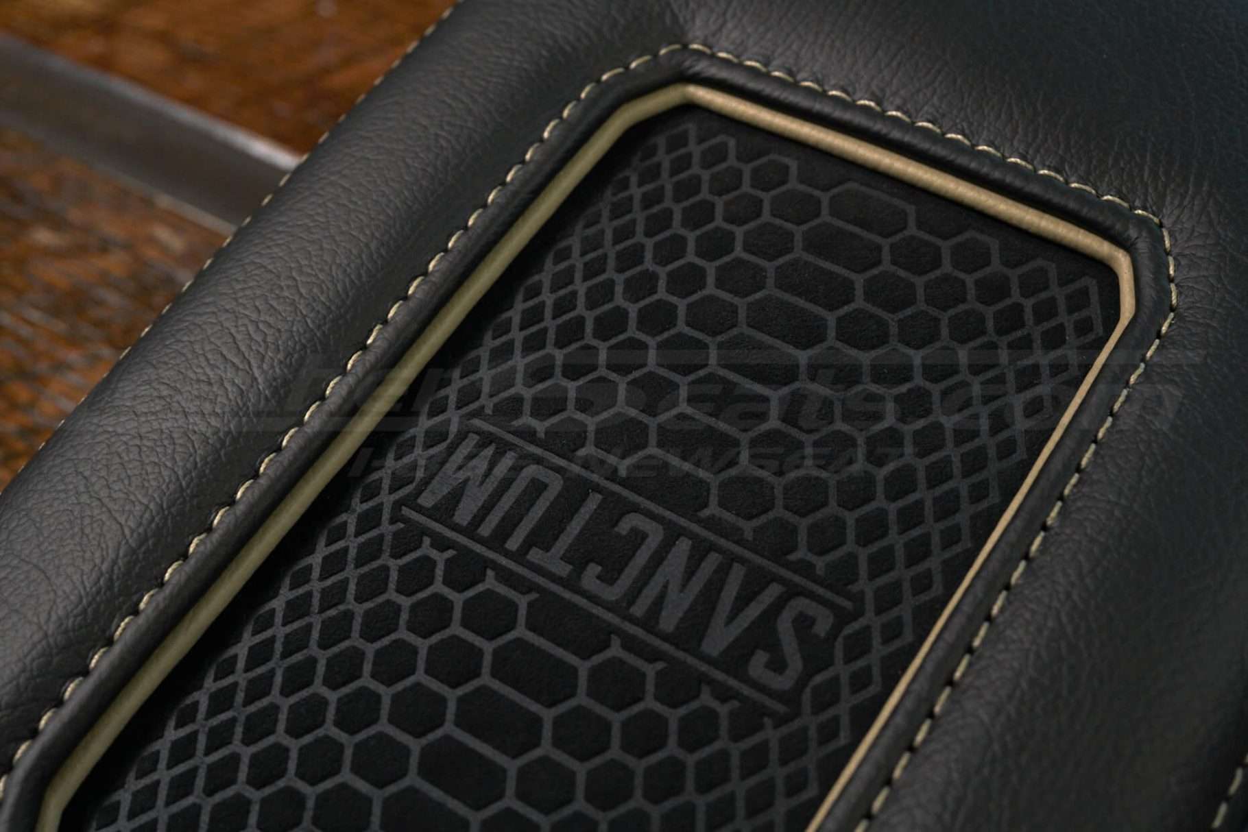 Sancum suded charging pad woth Bamboo trim ring and stitching