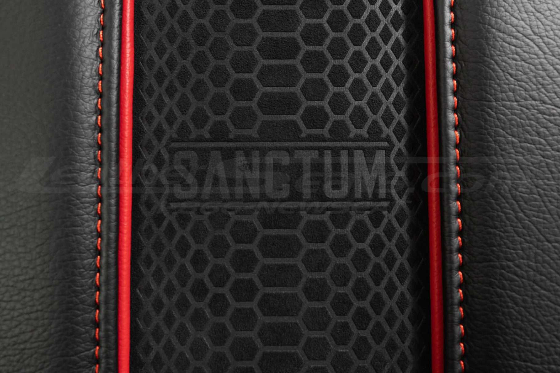 Close-up on Sanctum suede charging pad