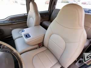 Headrest section of driver seat with matching stitching