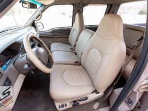 Ford F-250 with Nutmeg leather interior - front jump seat raised position
