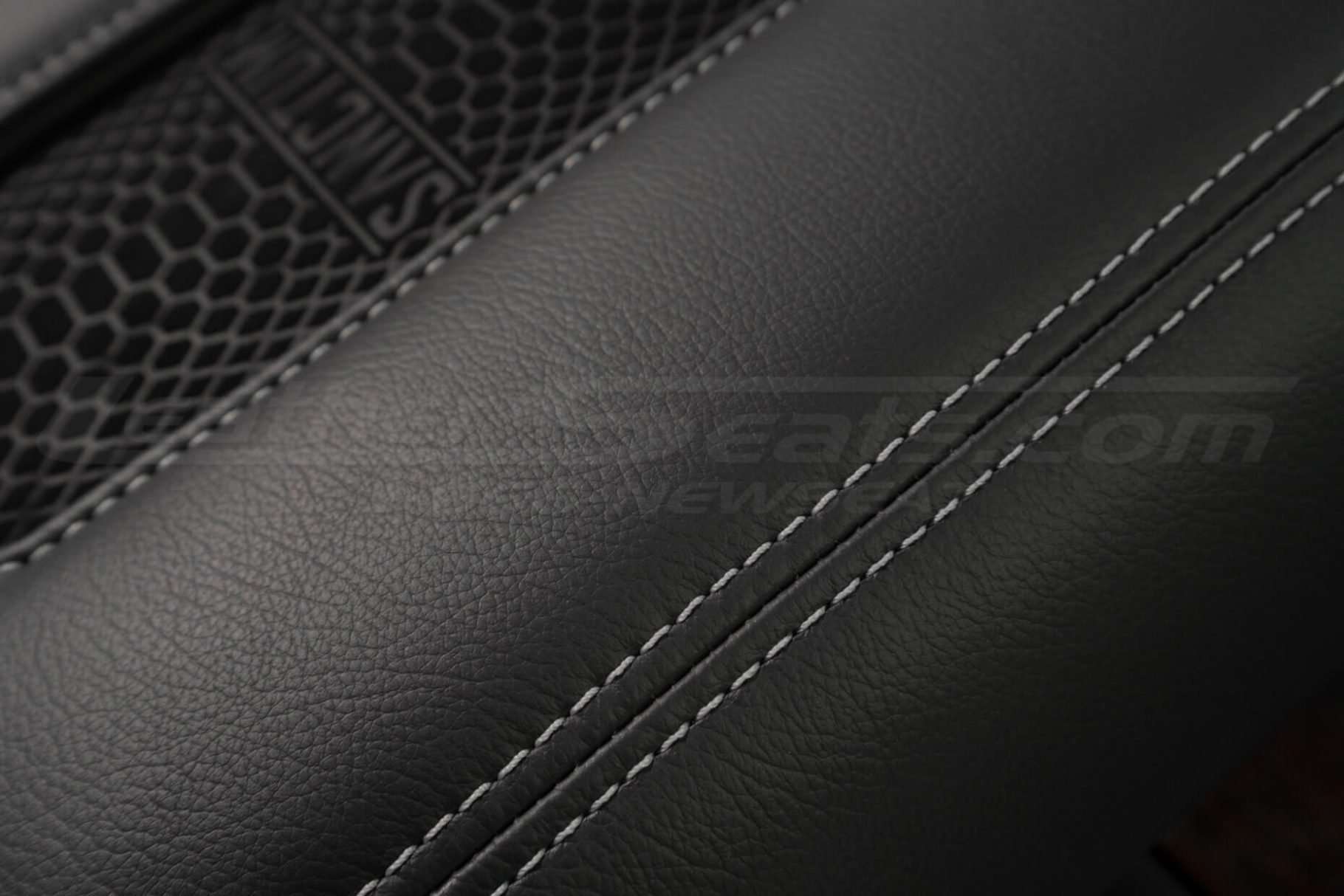 Leather charging console lid with Charcoal leather and Dove Grey stitching