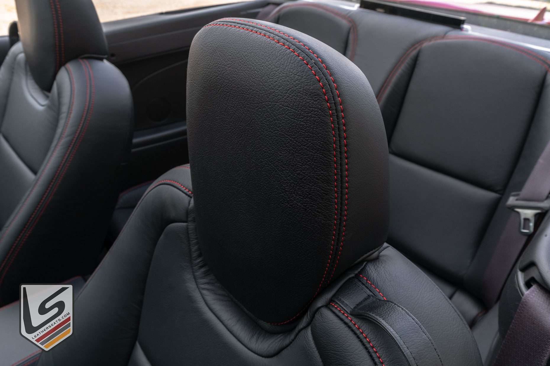 Leather headrest close-up with Cardinal stitching