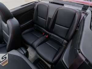 Top down view of rear leather seats from driver's side