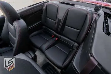 Top down view of rear leather seats from driver's side