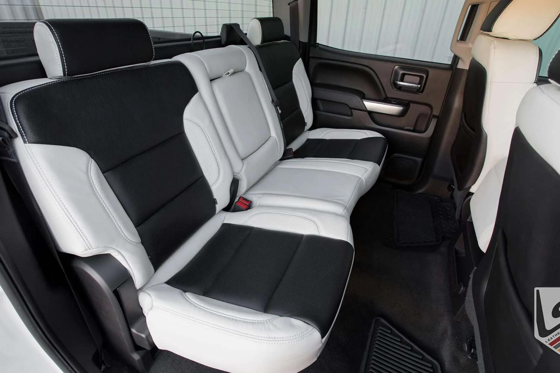 Leatherseats.com interior for Chevy Silverado - Rear seats from passenger side