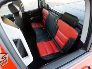 Top-down view of rear leather seats from driver's side