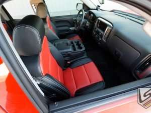 Top-down view of full Silverado passenger seat in Black and Bright Red leather with contrasting stitching