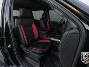 Wide angle of front passenger seat with custom leather seats