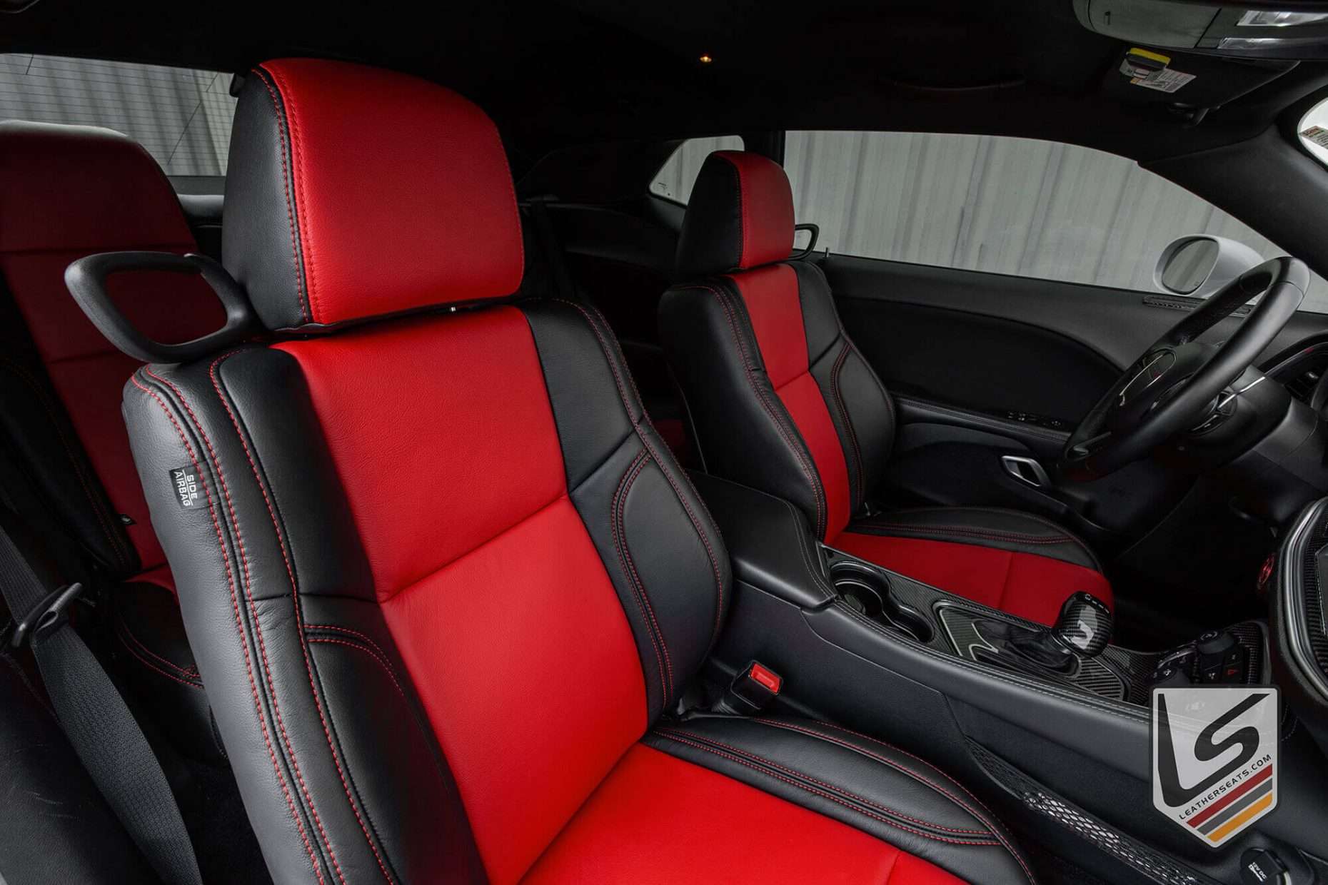 Black & Bright Red headrest and backrest section of passenger seat