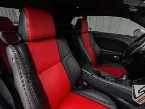 Black & Bright Red headrest and backrest section of passenger seat