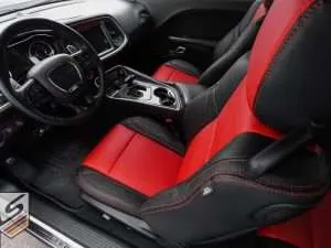 Dodge Challenger top-view of front driver seat with Bright Red stitching
