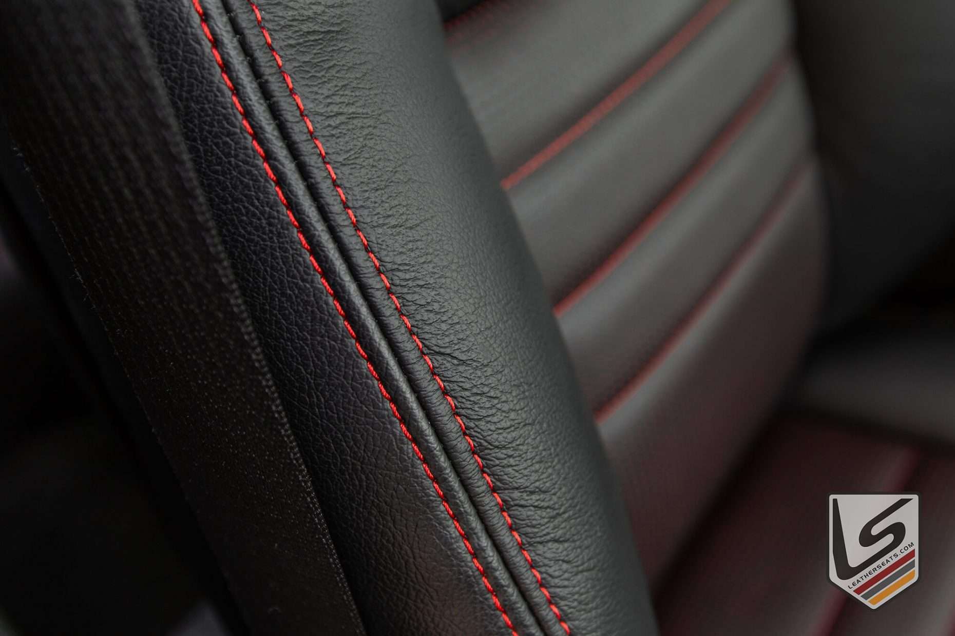 Black leather bolster with Red contrasting stitching