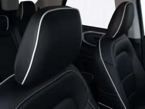 Leather headrest close-up with contrasting White Piping
