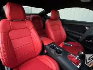 Front backrest and headrest section of Bright Red Ford Mustang seats