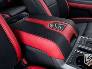 Leatherseats.com branded console lid cover in black and bright red