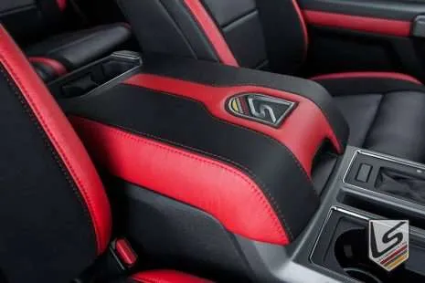 Leatherseats.com branded console lid cover in black and bright red