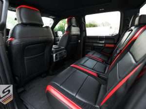 Back view of front seats showing black MAP pockets