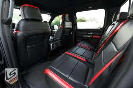 Back view of front seats showing black MAP pockets