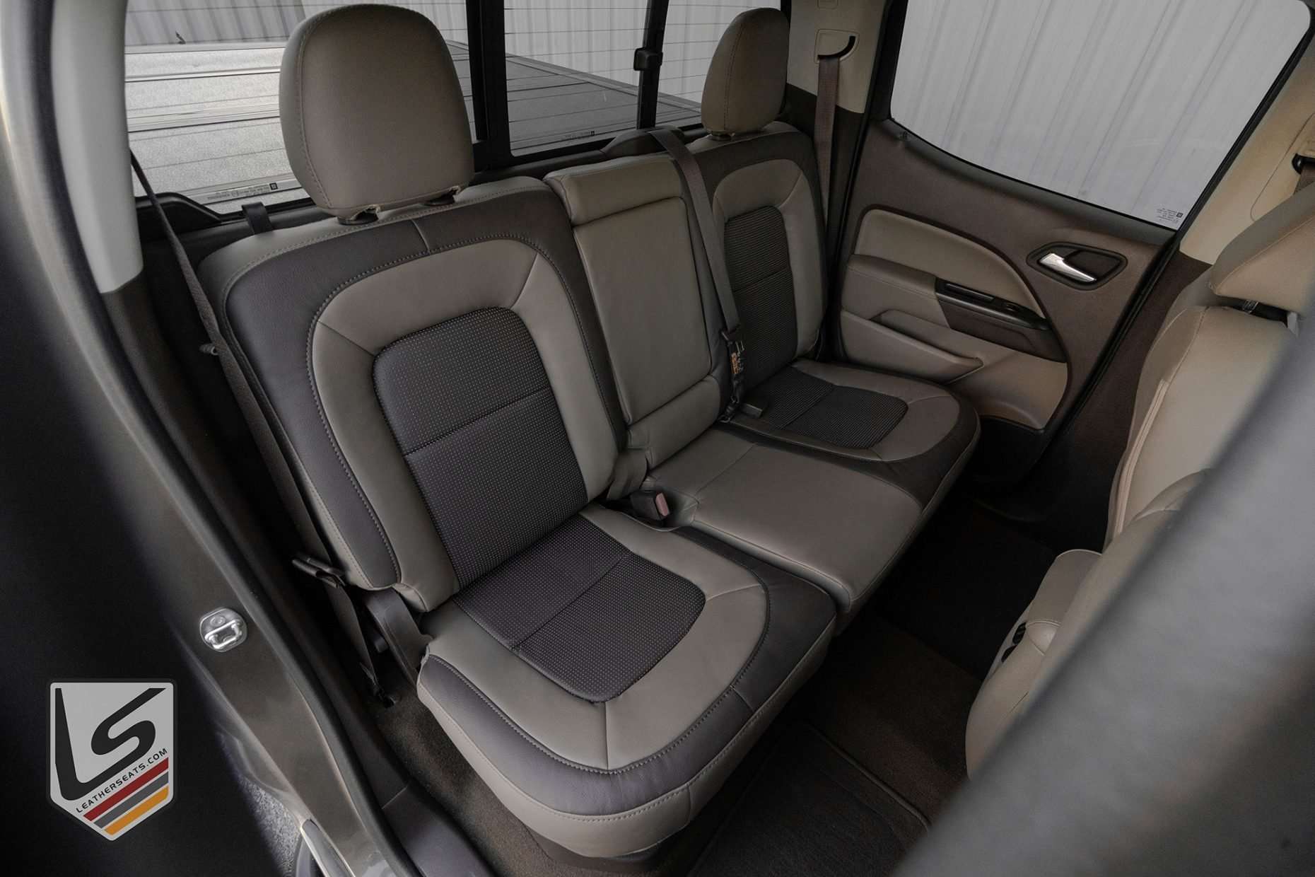 GMC Canyon with installed two-tone leather seats - Rear seats from passenger side