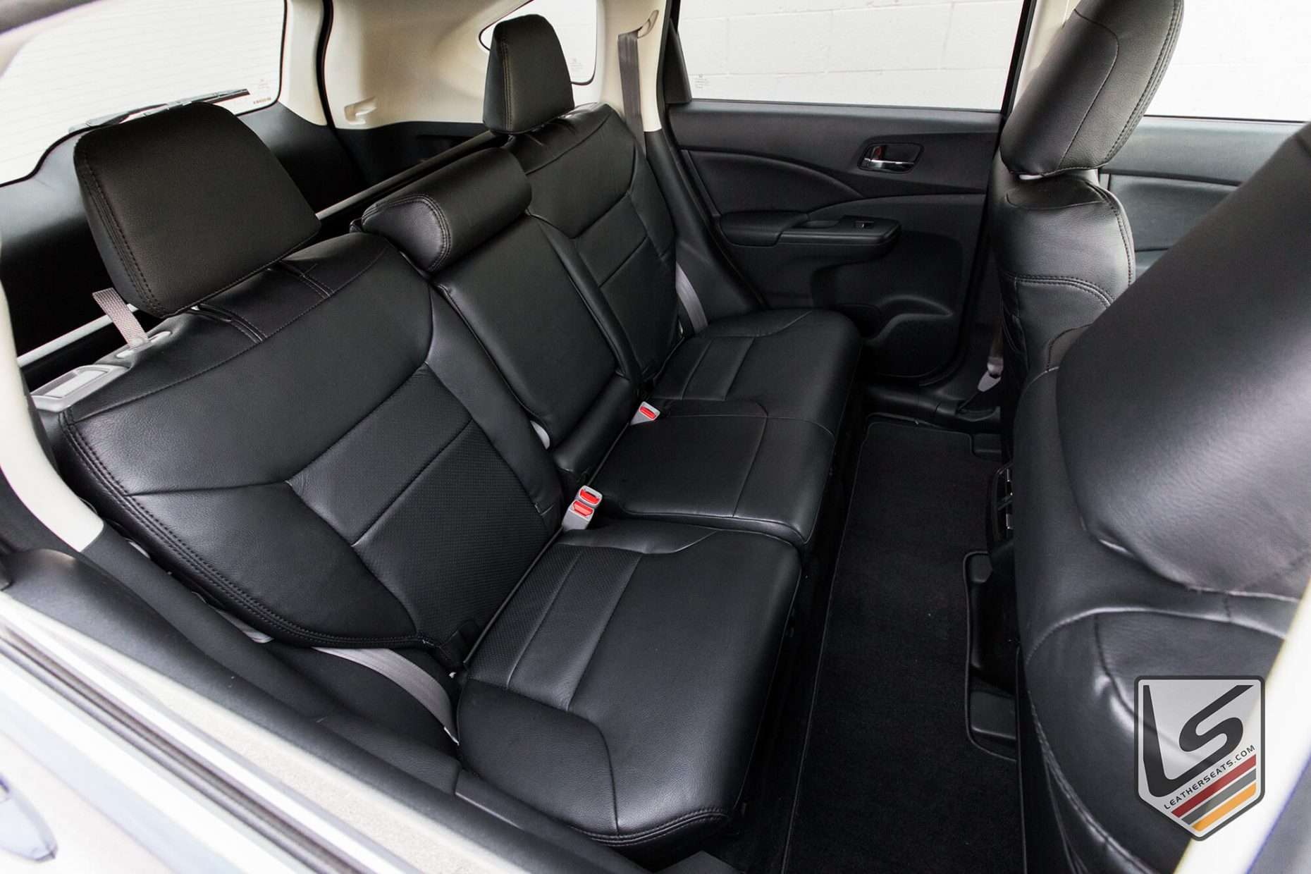 2015 Honda Cr-V with Black leather seats - REar seats from passenger side