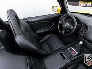 Top down view of front driver seat from passenger side