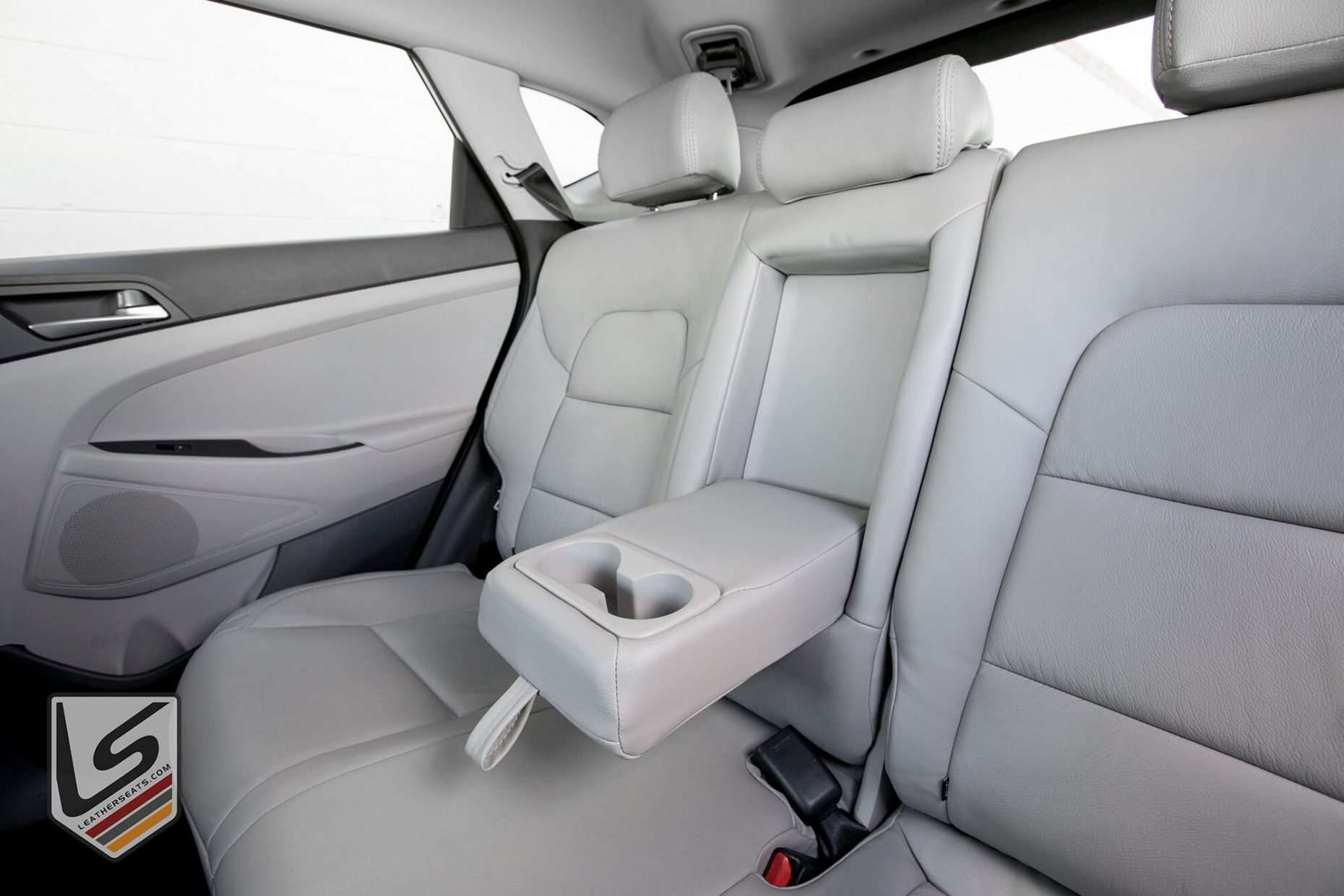 Rear seat leather armrest/cup ohlder - folded down