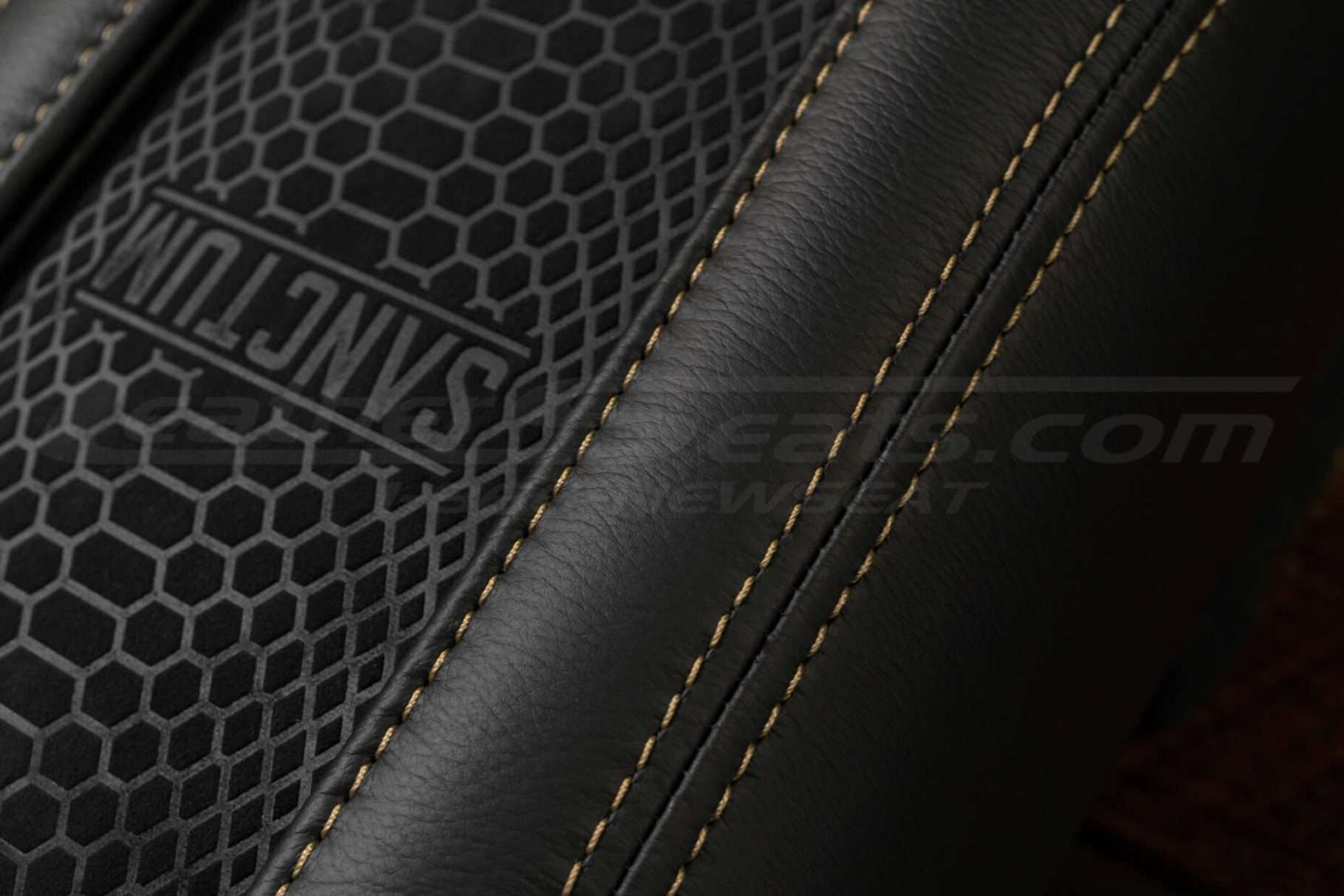 Contrasting Tan stitching