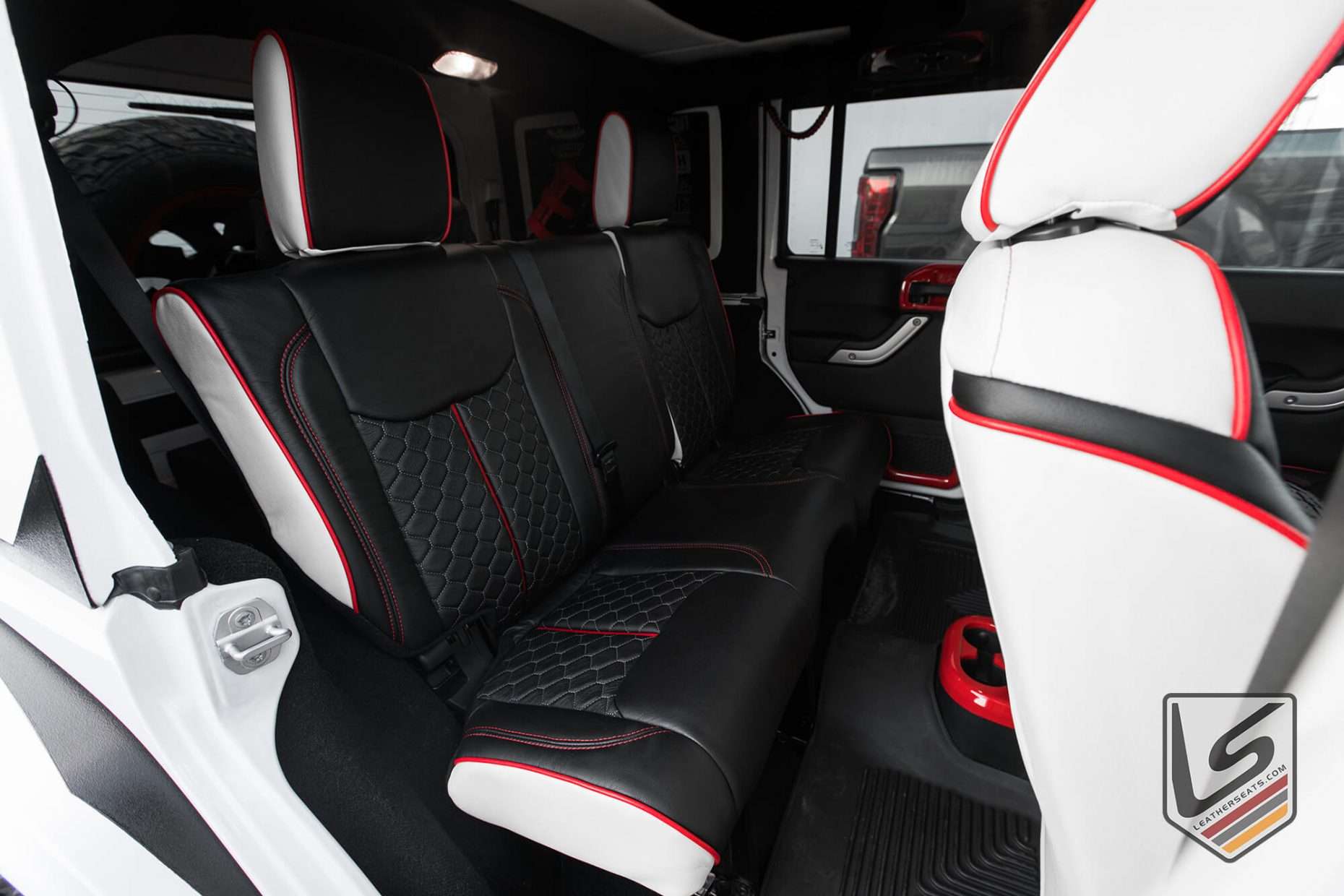 CustomCNC stitched leather seats in White and Black