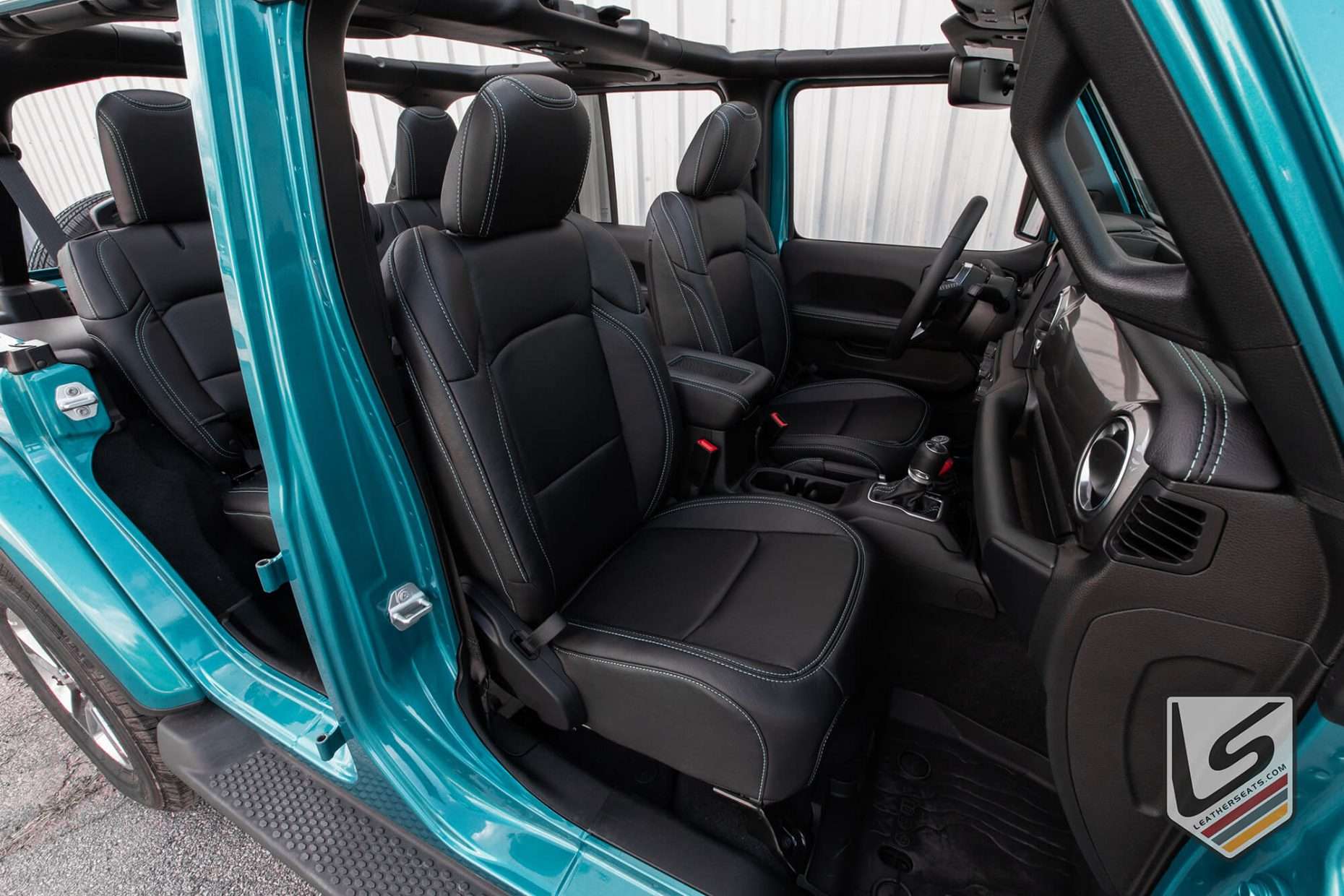 Front passnger leather seat in Black with Turquoise stitching