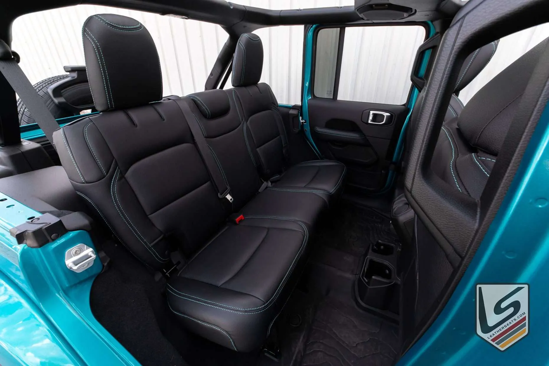Jeep Wrangler rear leather seats in Black, perforated inserts and contrasting Turquoisestitching