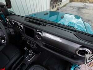 Custom leather dash insert in Black leather with Turquoisestitching